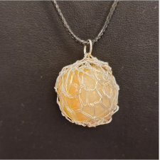 calcite pendant with knitted wire surround