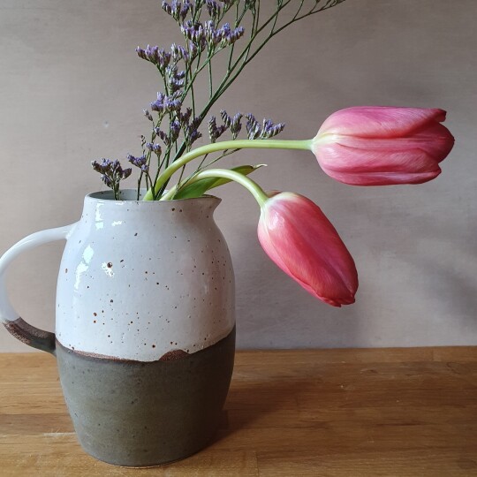 brown and white jug