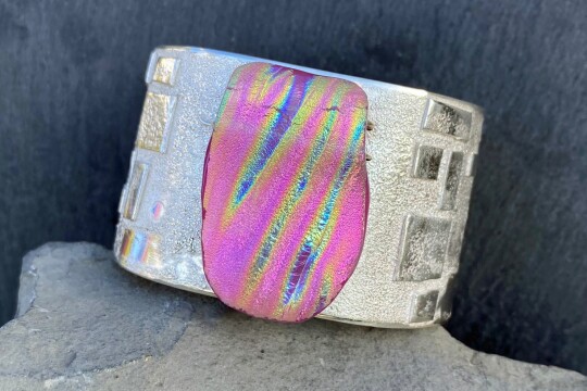 UAP cuff fused with pink dichroic glass
