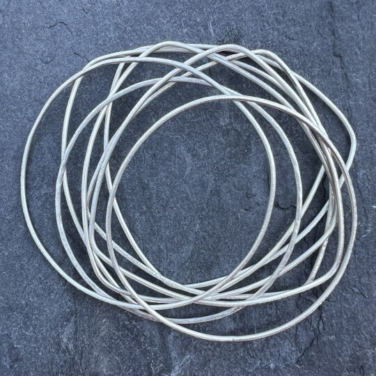 UAP438 and 439 round nd triangular textured wire bangles